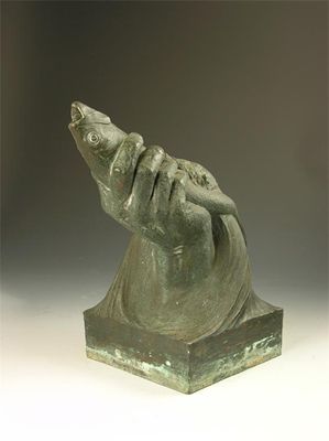 Appraisal: A bronze fountain head with a square base and a