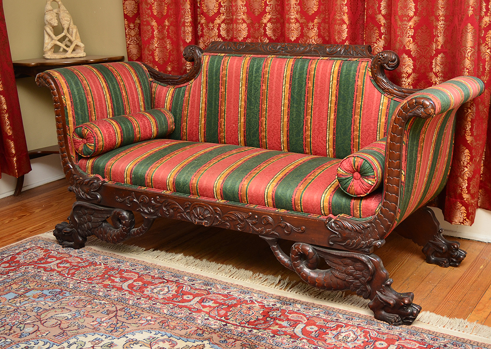 Appraisal: HIGHLY CARVED TH CENTURY TRANSITIONAL SOFA Richly carved and shaped