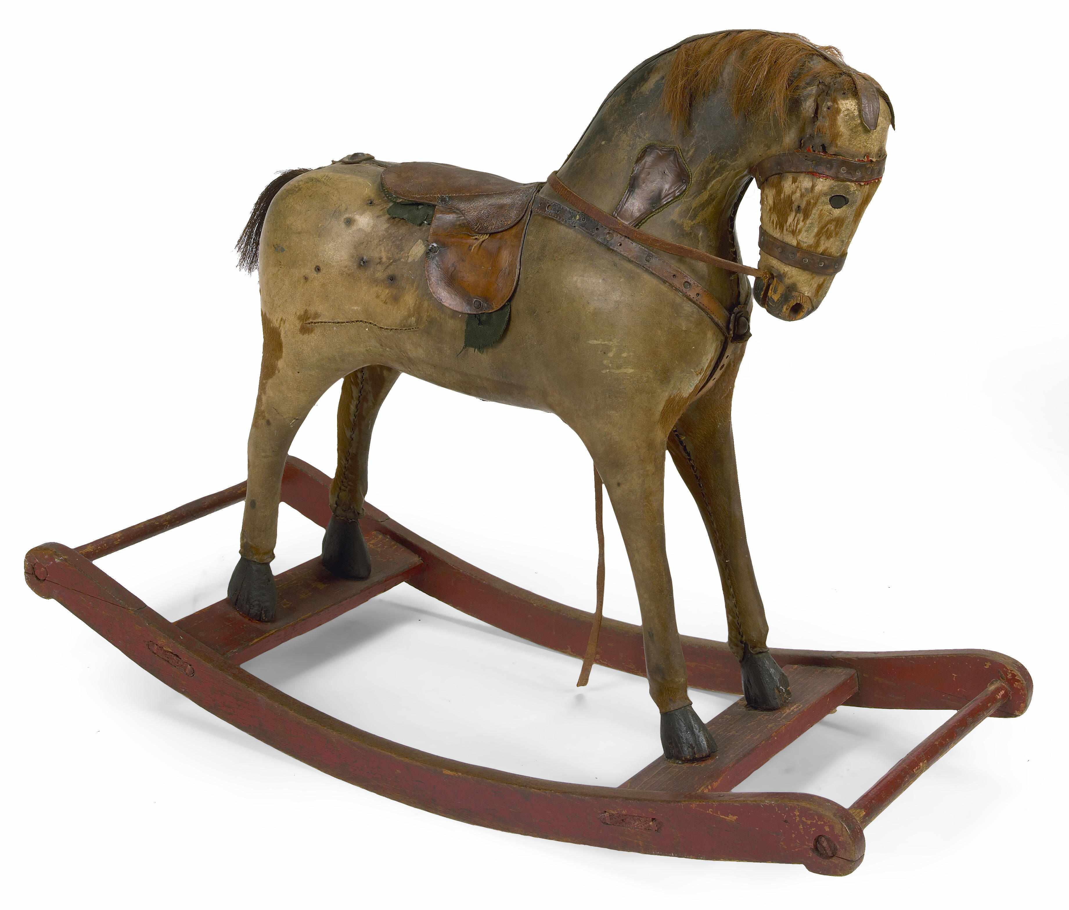 Appraisal: A painted leather and wood child's hobby horse height in