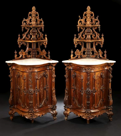 Appraisal: Rare Pair of American Rococo Revival Rosewood Cabinet-Based Corner Etageres