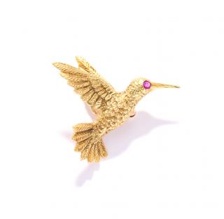 Appraisal: A HUMMINGBIRD WITH RUBY EYE PIN A HUMMINGBIRD WITH RUBY