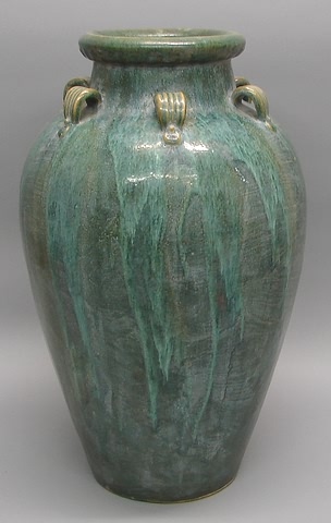 Appraisal: Baluster form with blue-green glaze small ribbed loops in circle