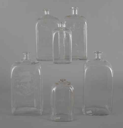 Appraisal: Six etched colorless glass bottles th c tallest - h