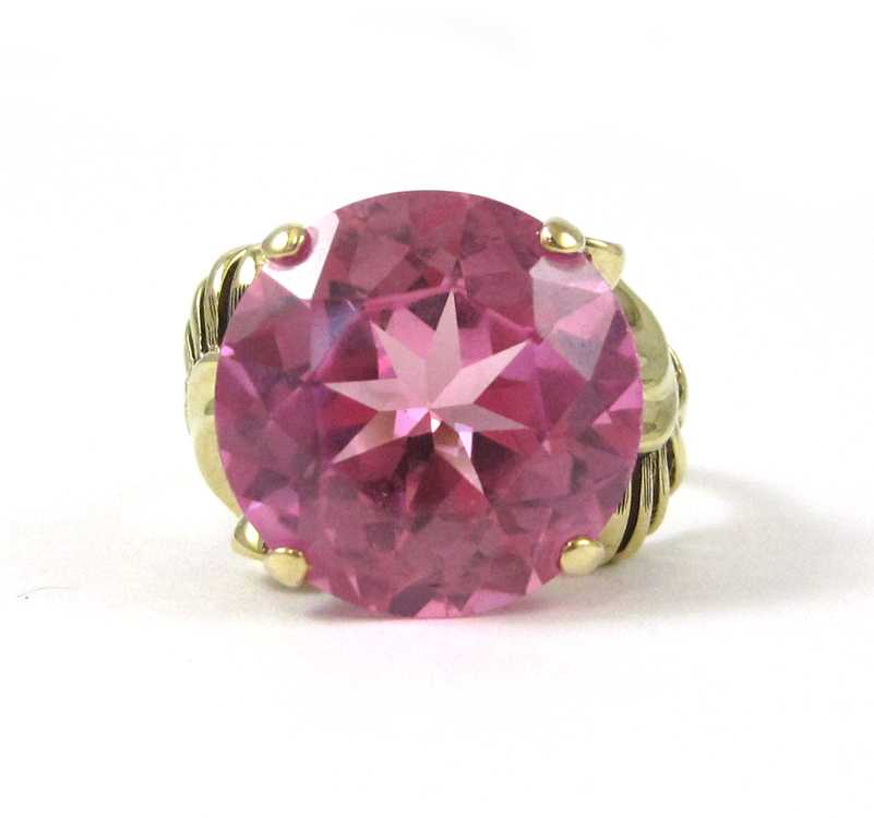 Appraisal: PINK SPINEL AND TEN KARAT GOLD RING set with a