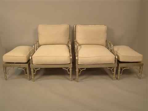 Appraisal: TWO CHINESE CHIPPENDALE STYLE NICKLE-PLATED CLUB CHAIRS WITH MATCHING OTTOMANS