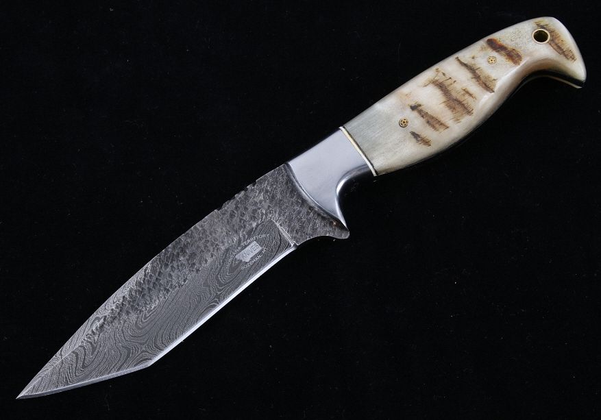 Appraisal: M T Knives Rams Horn Damascus Hammered Knife This is