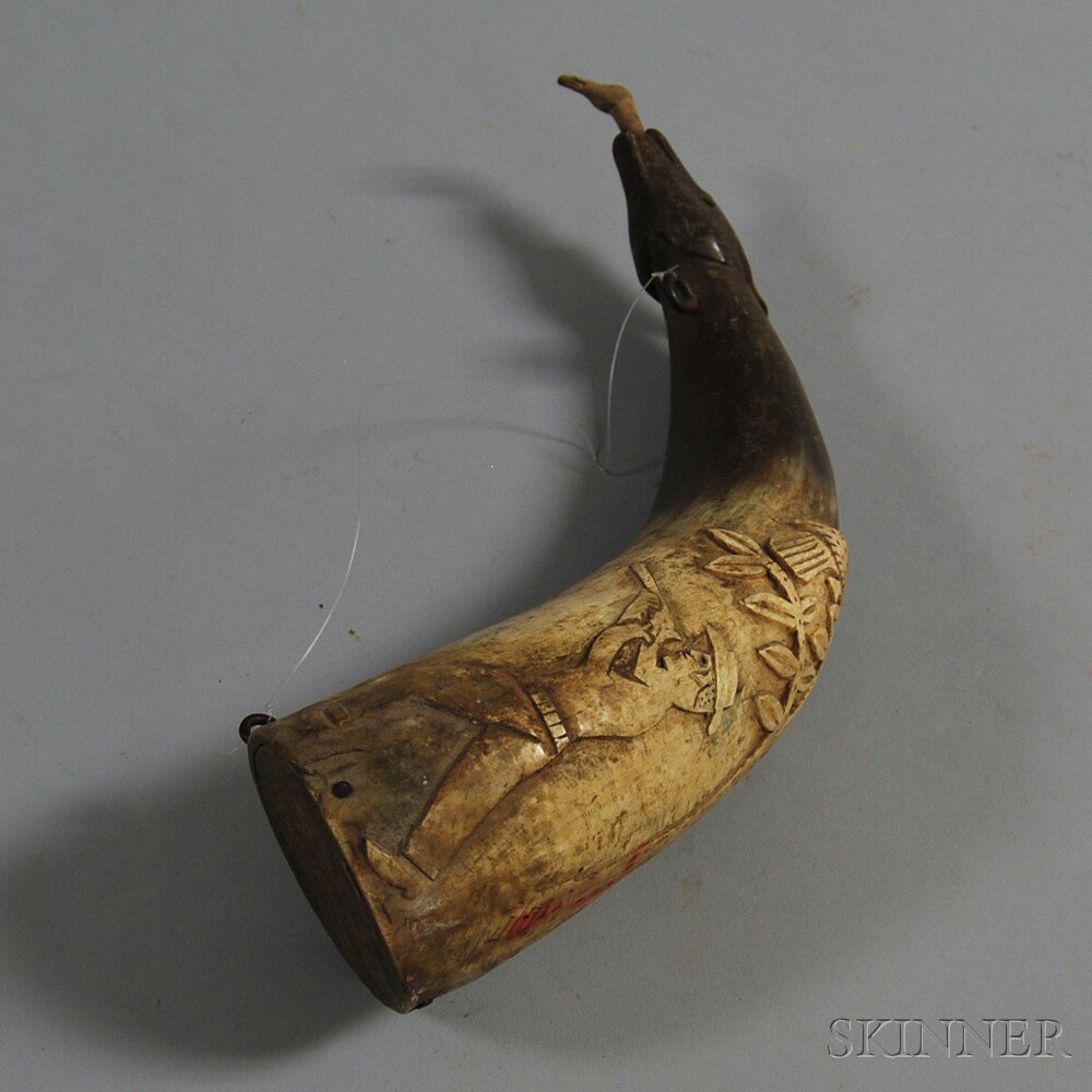 Appraisal: Carved Powder Horn th century the horn with relief-carved hunting