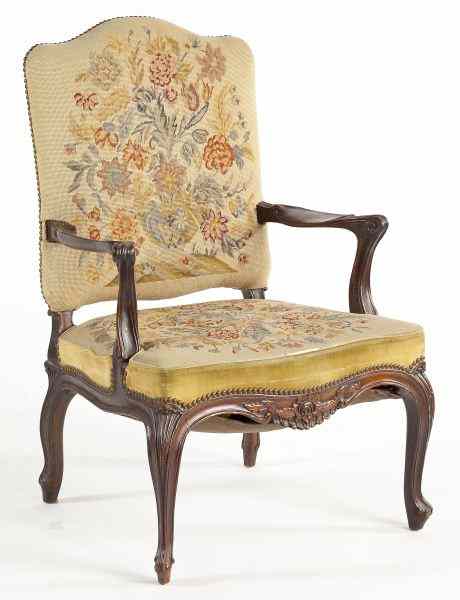 Appraisal: Continental Open Arm Chairmahogany circa needlepoint upholstered back and seat