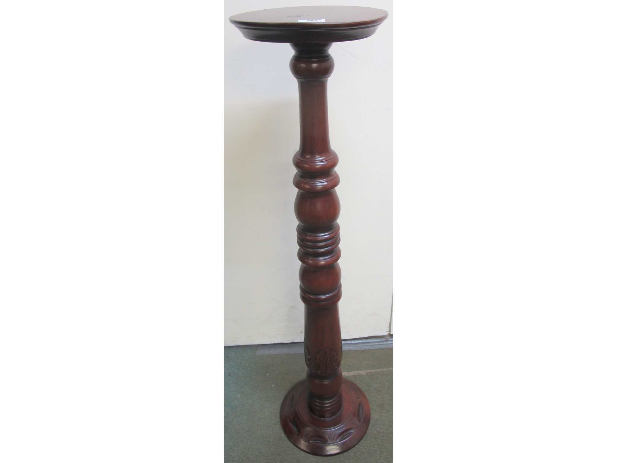 Appraisal: A mahogany torchere