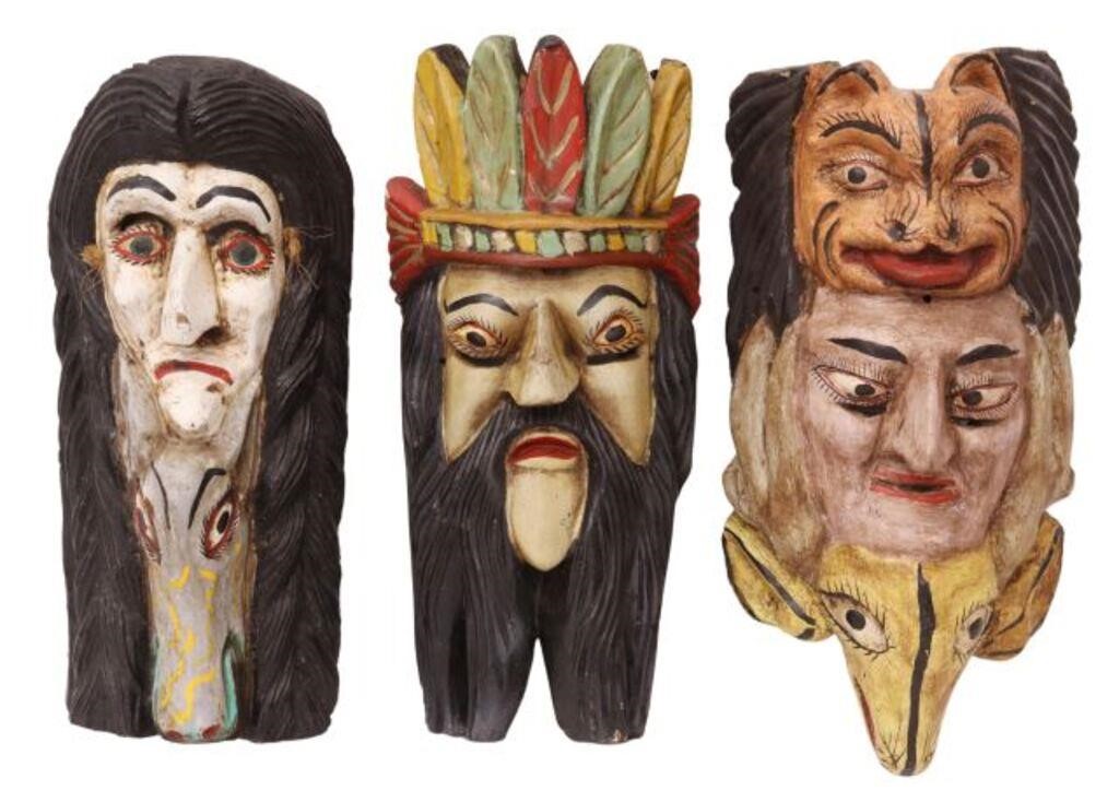 Appraisal: lot of Large carved and polychrome painted folk art masks