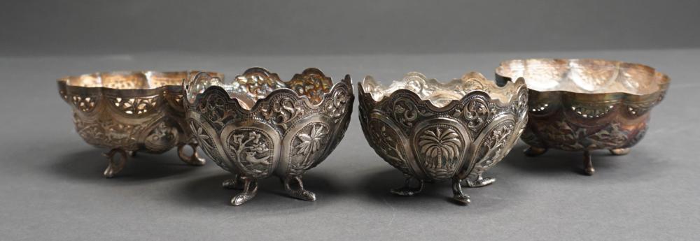 Appraisal: TWO PAIRS PROBABLY MALAYSIAN TESTED SILVER FOOTED CUPS H TALLER