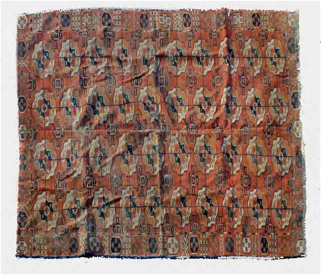 Appraisal: A TURKOMAN MAIN CARPET decorated four rows of guls within