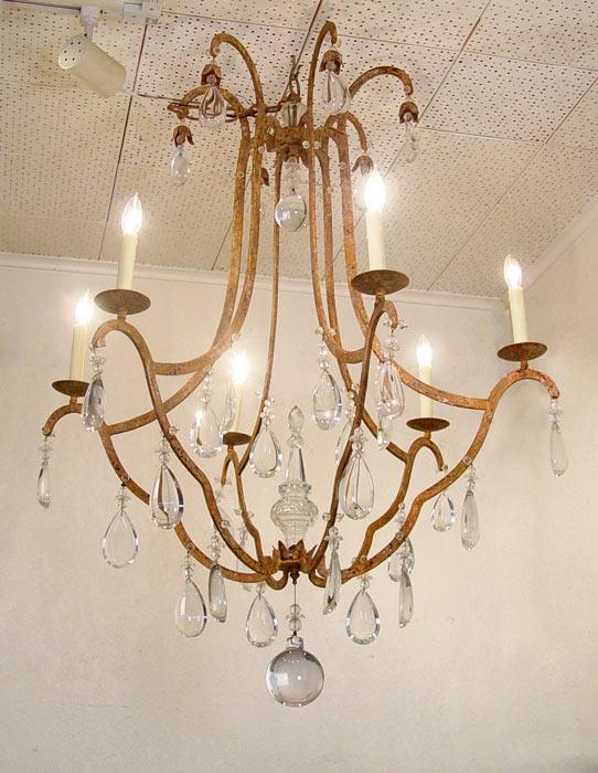 Appraisal: LIGHT METAL AND GLASS PRISM CHANDELIER Cast metal body with