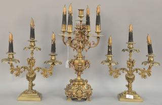 Appraisal: Three piece bronze candelabra group ht in and three busts