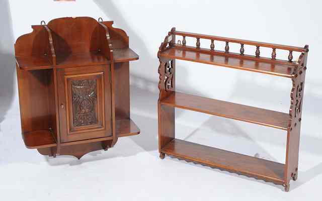 Appraisal: A VICTORIAN MAHOGANY HANGING WALL SHELF with pierced fretwork decoration