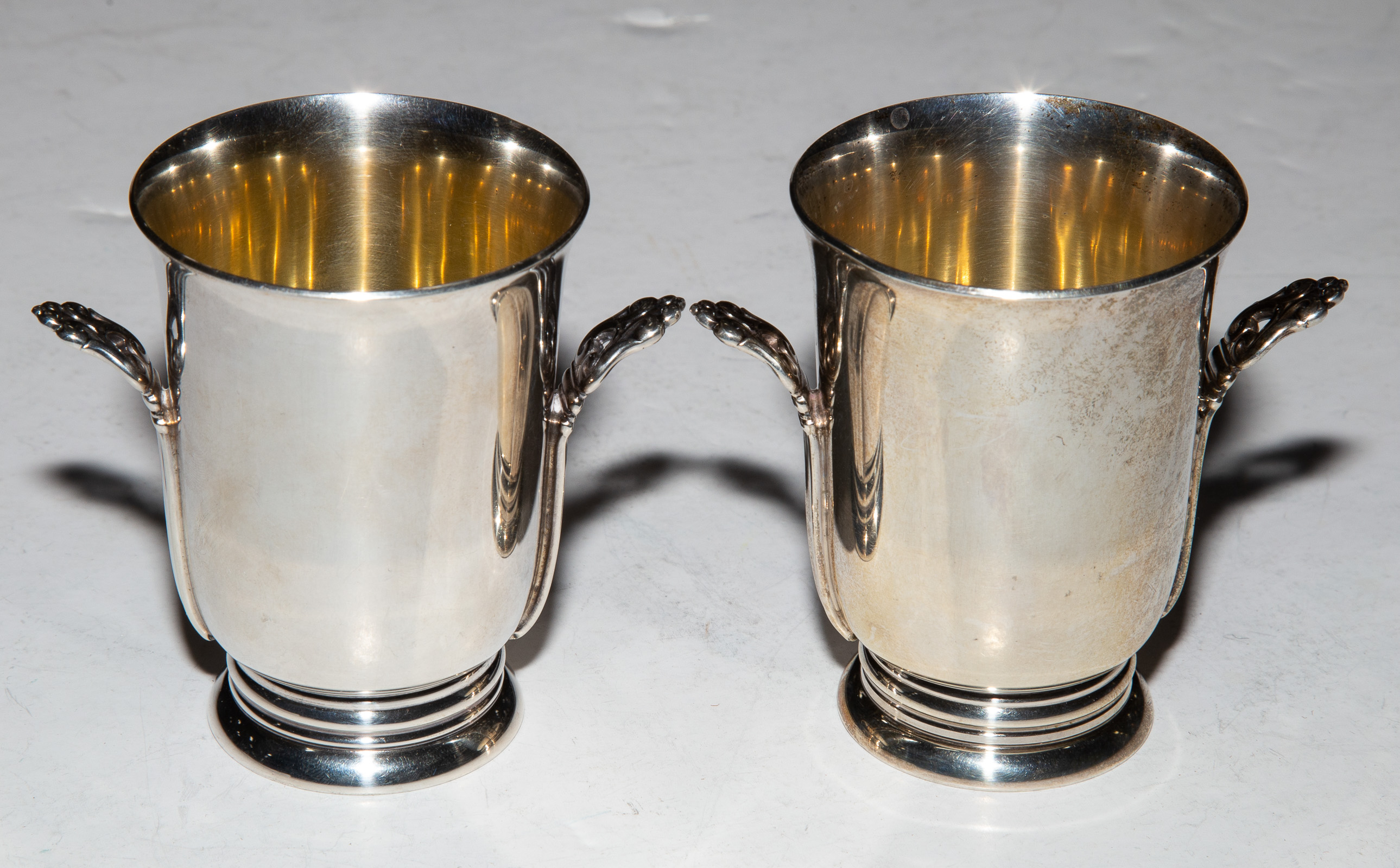 Appraisal: PAIR INT'L STERLING ROYAL DANISH CIGARETTE URNS in H ozt