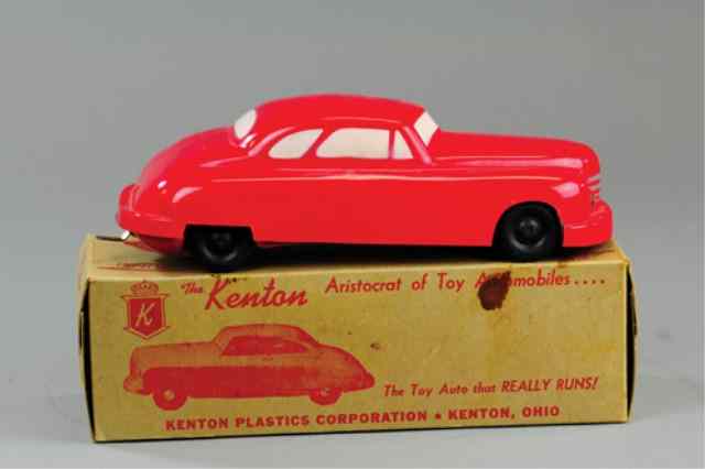 Appraisal: KENTON BOXED COUPE Plastic model bright red overall windows in