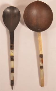 Appraisal: Pair of th C Wooden Spoons w Shell Handles Encompassed