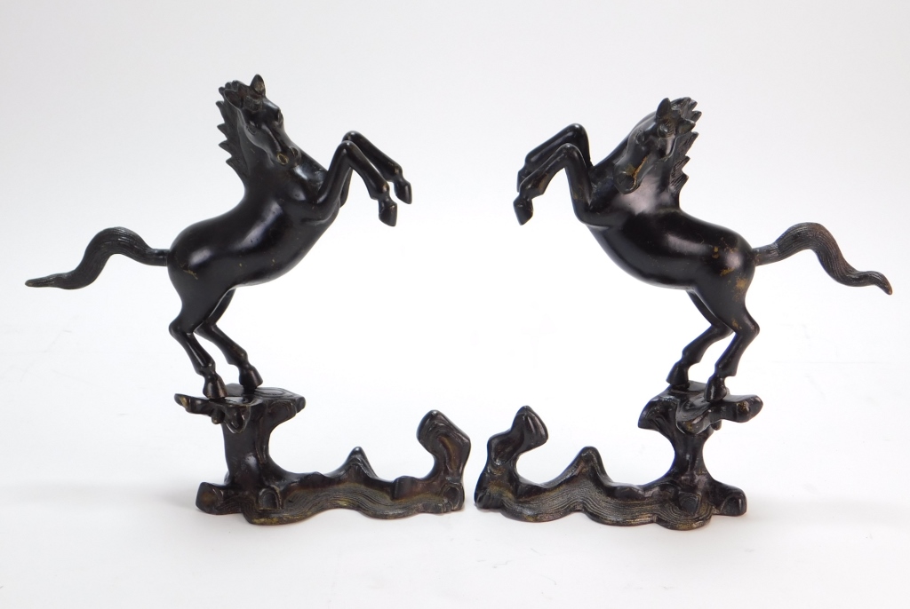 Appraisal: PR JAPANESE ANIMALIER BRONZE HORSE SCULPTURES Japan th CenturyOpposing sculptures