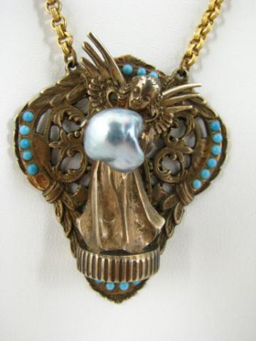 Appraisal: Sterling angel motif pendant with twenty twenty-first turquoise missing bead