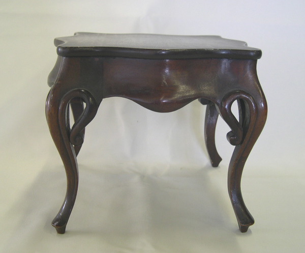 Appraisal: Continental Carved Mahogany and Walnut Miniature Serpentine-Edged Center Table in