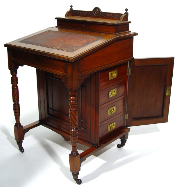 Appraisal: Victorian walnut davenport the superstructure enclosing a letter rack and