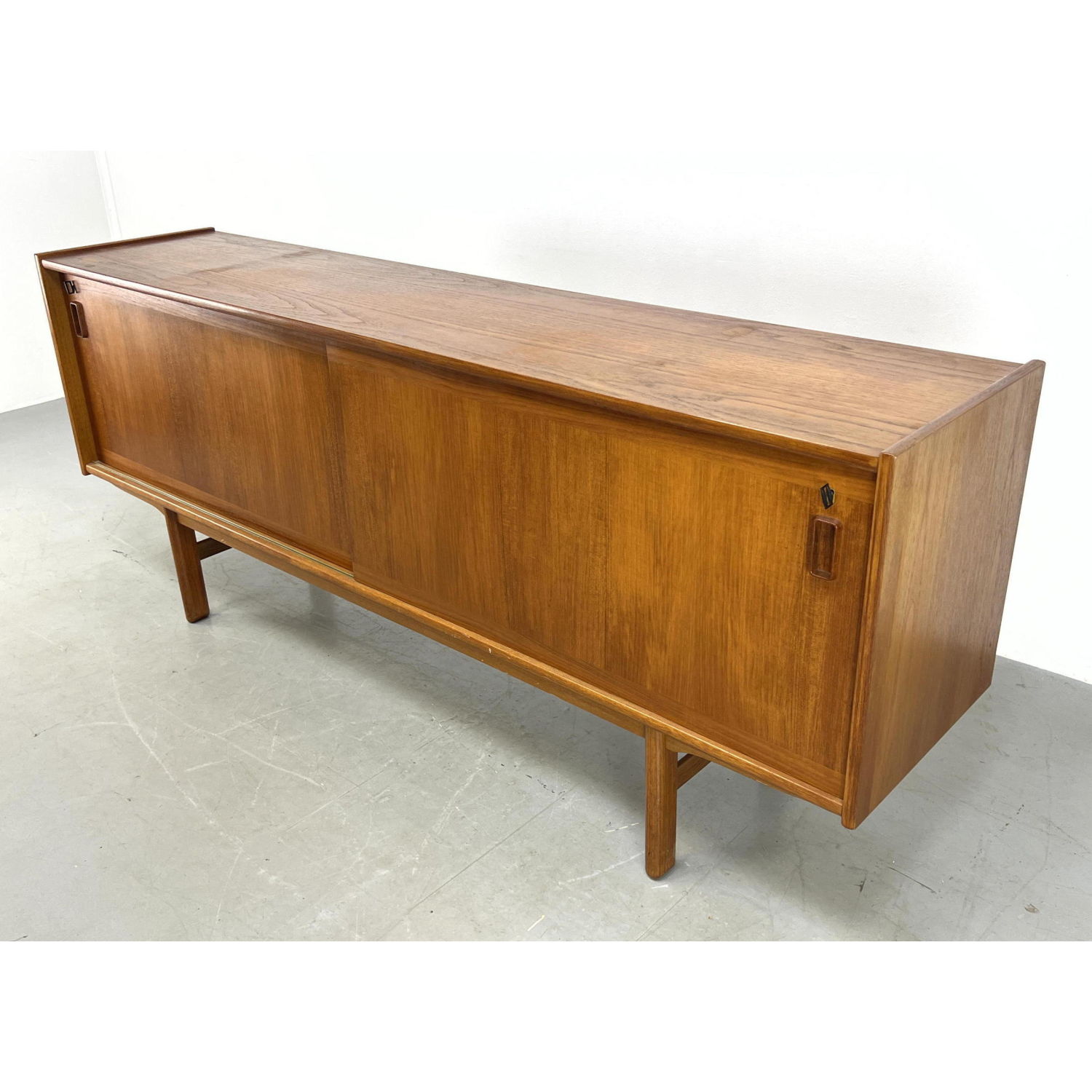 Appraisal: Norway Modern Teak Credenza Sideboard Fitted interior Raised on legs