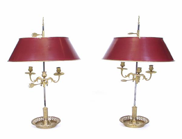 Appraisal: A pair of bouillotte lamps with tole shades height in