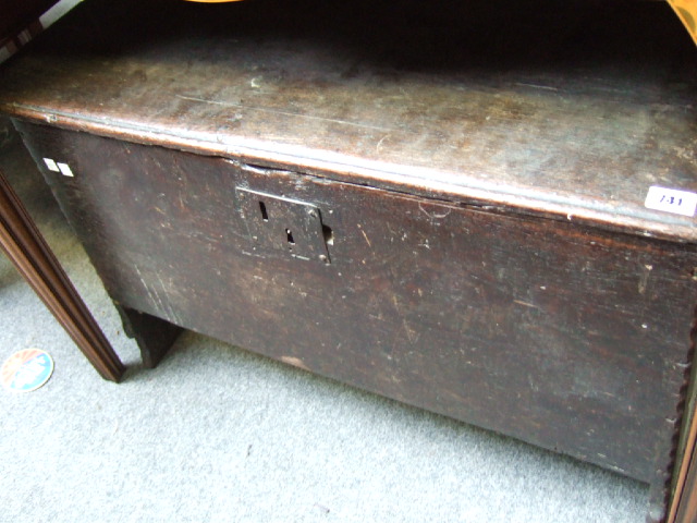 Appraisal: A th th century oak plank coffer with chip work