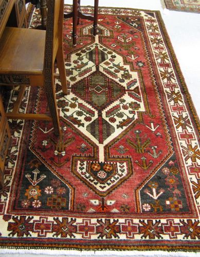 Appraisal: PERSIAN TRIBAL AREA RUG Hamadan villages region central geometric medallion