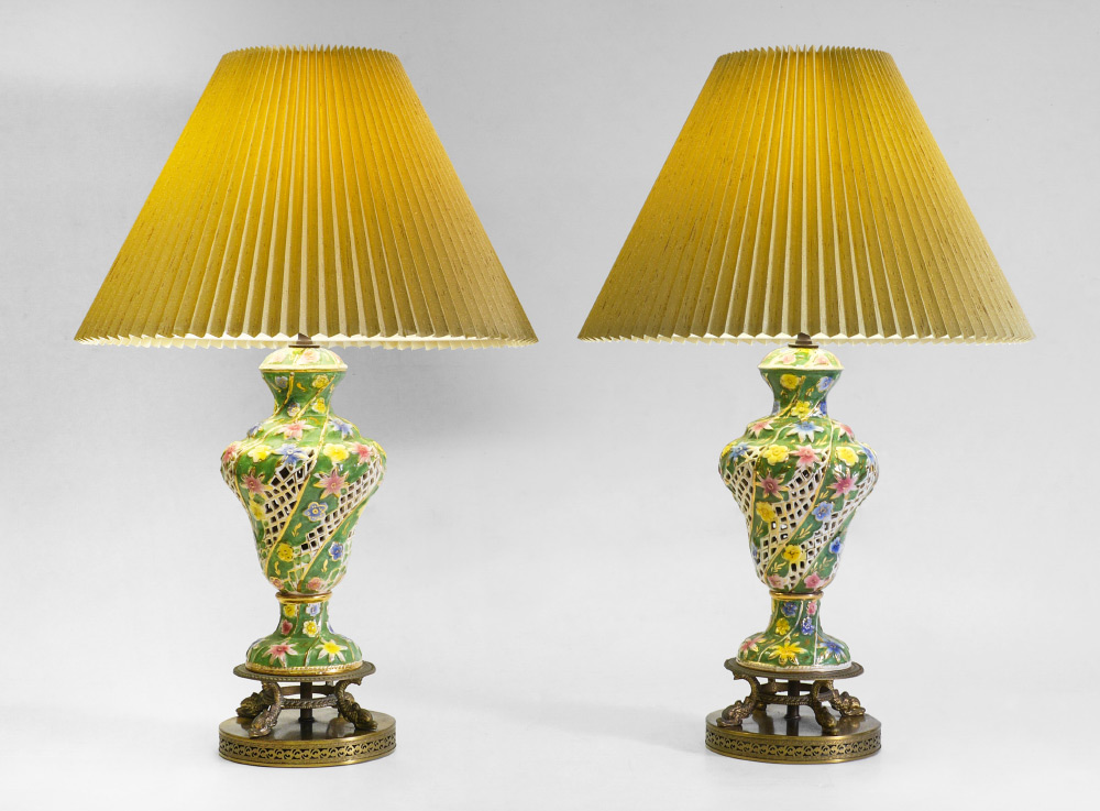 Appraisal: PAIR RETICULATED FLORAL MOTIF PORCELAIN LAMPS Continental floral motif reticulated