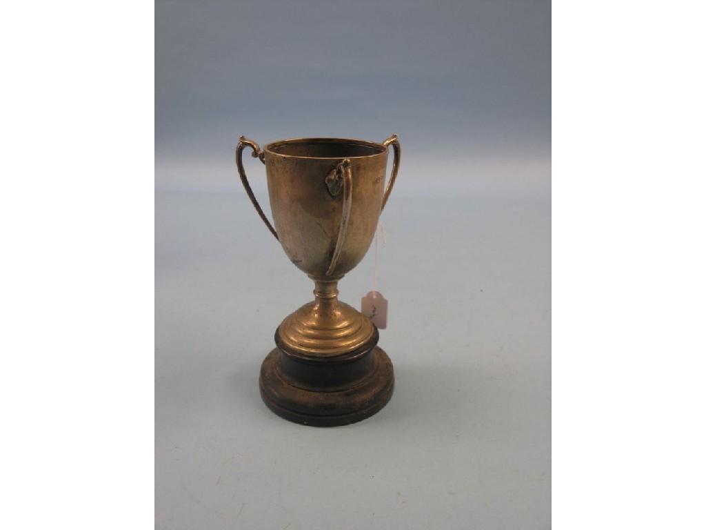 Appraisal: The Chiddingfold Hunt silver trophy three-handled pedestal form Birmingham in