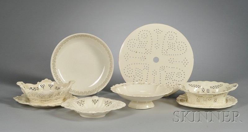 Appraisal: Eight Pierced Creamware Tableware Items England late th century including