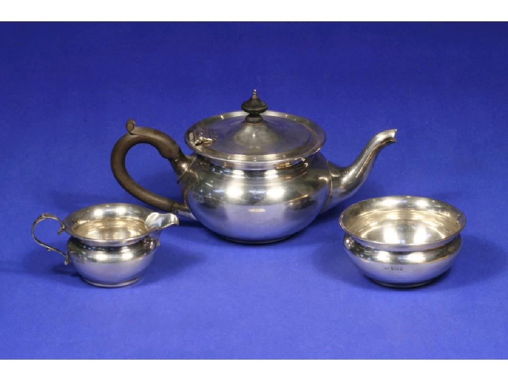 Appraisal: A THREE PIECE TEA SET of circular bellied form with