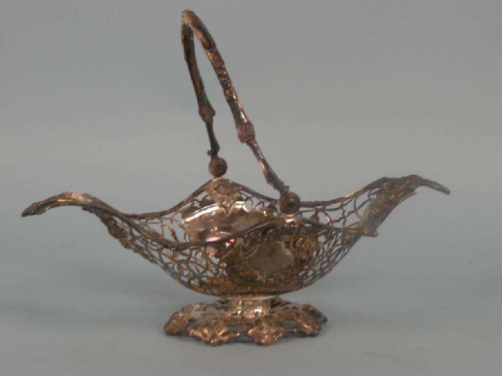 Appraisal: A Victorian pierced silver basket the swing handle cast with