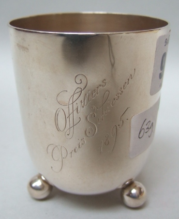 Appraisal: A Woollenwebber cup on triple ball feet inscribed 'Offiziers Preis