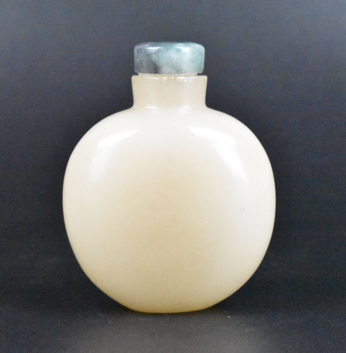 Appraisal: A Chinese white jade carved snuff bottle dating from the