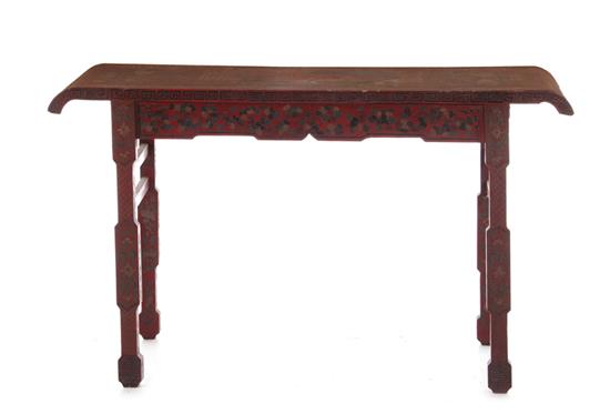 Appraisal: Chinese red lacquer altar table circa incise-carved decorative panels trestle