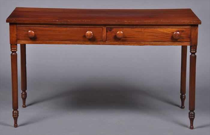 Appraisal: FEDERAL-STYLE MAHOGANY SIDE TABLE Containing two frieze drawers with turned