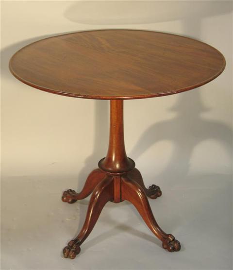 Appraisal: CHIPPENDALE STYLE MAHOGANY TEA TABLE The circular top with slight