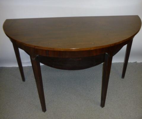 Appraisal: A MAHOGANY DINING TABLE of circular form with single drop