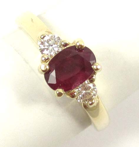 Appraisal: RUBY DIAMOND AND FOURTEEN KARAT GOLD RING with two round-cut