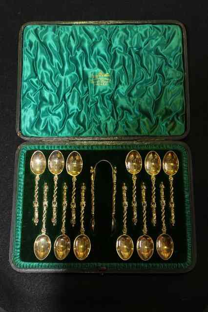 Appraisal: A SET OF TWELVE SILVER GILT APOSTLE SPOONS with twisted