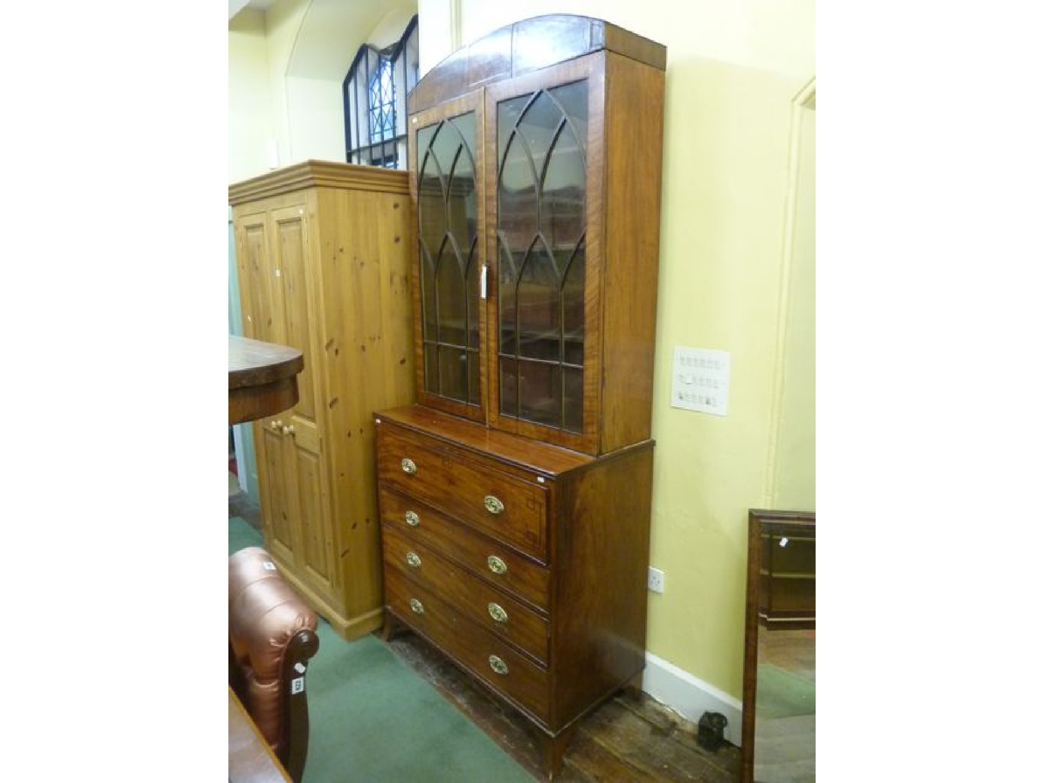 Appraisal: A Regency mahogany secretaire bookcase the secretaire with drawers and