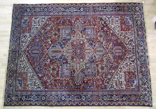 Appraisal: Roomsize Heriz rug ca with a central medallion on a