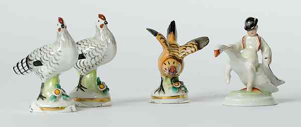 Appraisal: Hungarian and German Handpainted Porcelain Figures Hungarian and German four