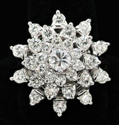 Appraisal: ct diamond cluster ring one central round brilliant-cut diamond estimated