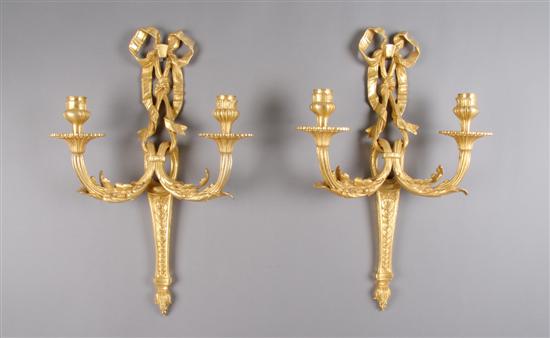 Appraisal: A Pair of Louis XVI Style Gilt Metal Two-Light Sconces