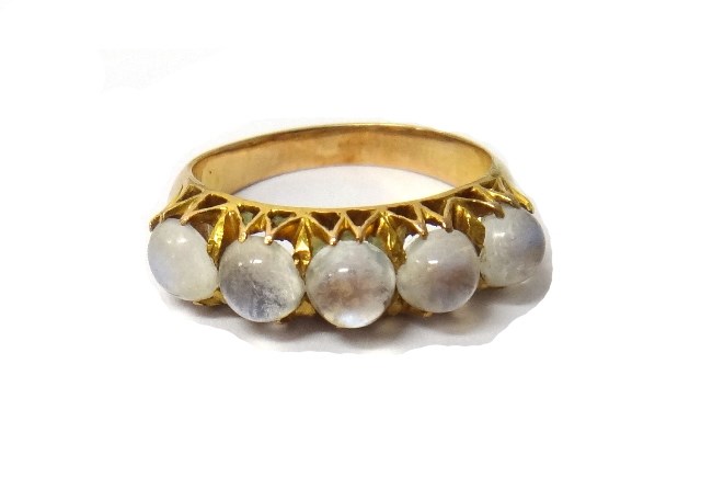 Appraisal: A gold and moonstone set five stone ring mounted with