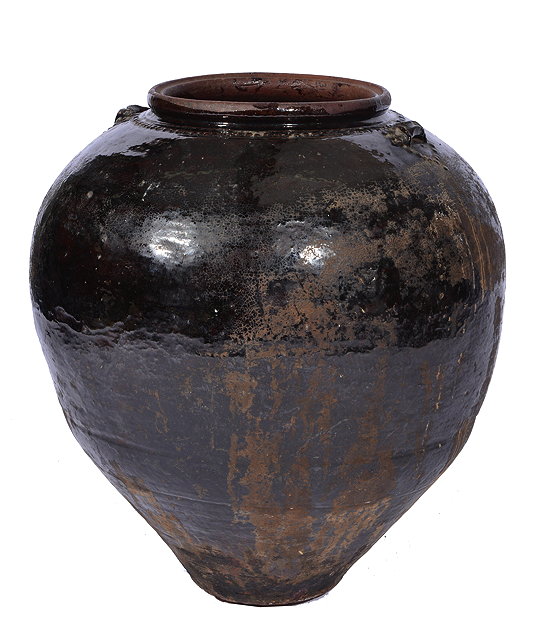 Appraisal: A LARGE MARTABAN BROWN GLAZED OVOID VASE with studded decoration